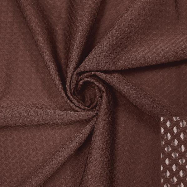 A swirled piece of Hive Textured Spandex in the color cocoa brown.