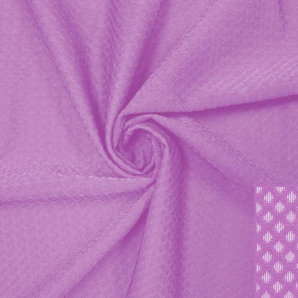 A swirled piece of Hive Textured Spandex in the color festival.