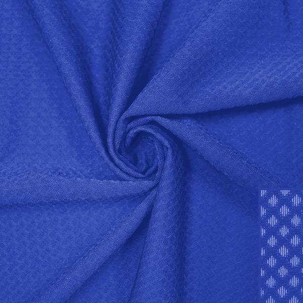 A swirled piece of Hive Textured Spandex in the color royal.