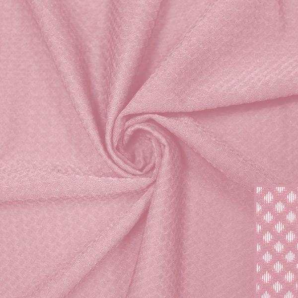A swirled piece of Hive Textured Spandex in the color shabby chic.