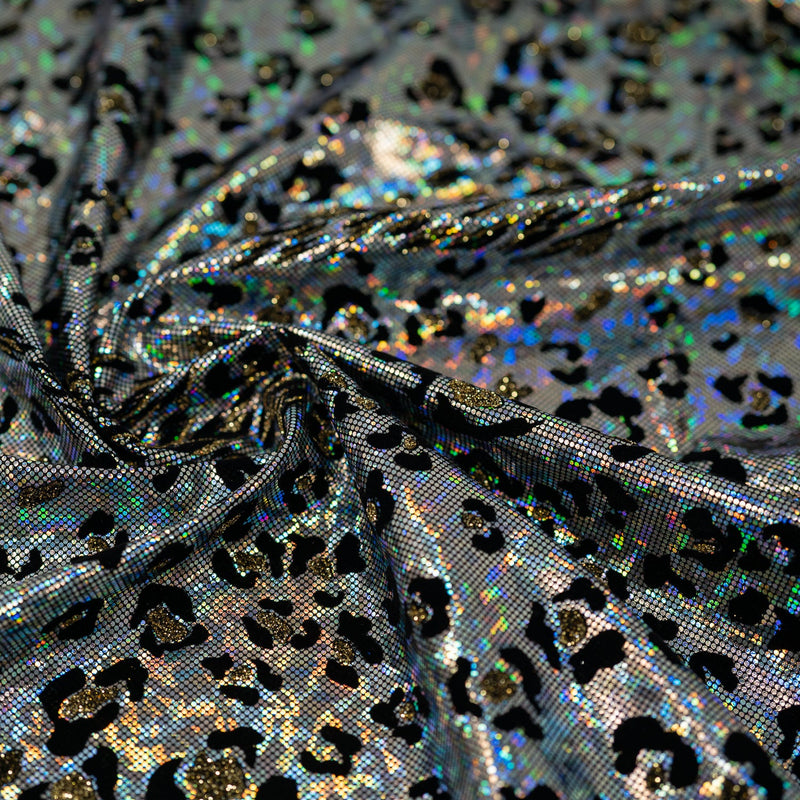 Swirled piece of Jag City Shattered Glass Foiled Spandex Fabric in the color Black-Silver