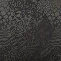 A flat sample of jungle patch foil printed superflex in the color matte black.