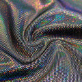 A swirled sample of legacy foiled stretch velvet in the color silver.