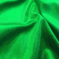 A swirled sample of legacy foiled stretch velvet in the color kelly green.