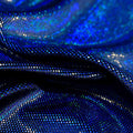 A swirled sample of legacy foiled stretch velvet in the color royal.