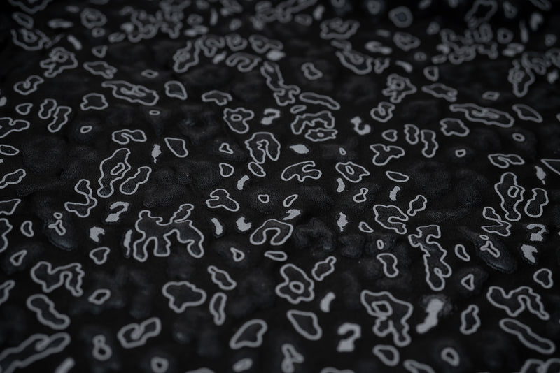 Detailed shot of Leo Party Foil Printed Spandex in color Black/Black.