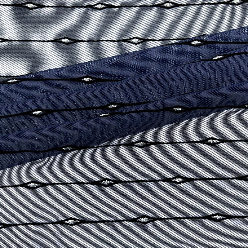 A flat sample of Linear Flocked Stretch Mesh in the color Navy
