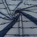 Swirled sample shot of Linear Flocked Stretch Mesh in the color navy