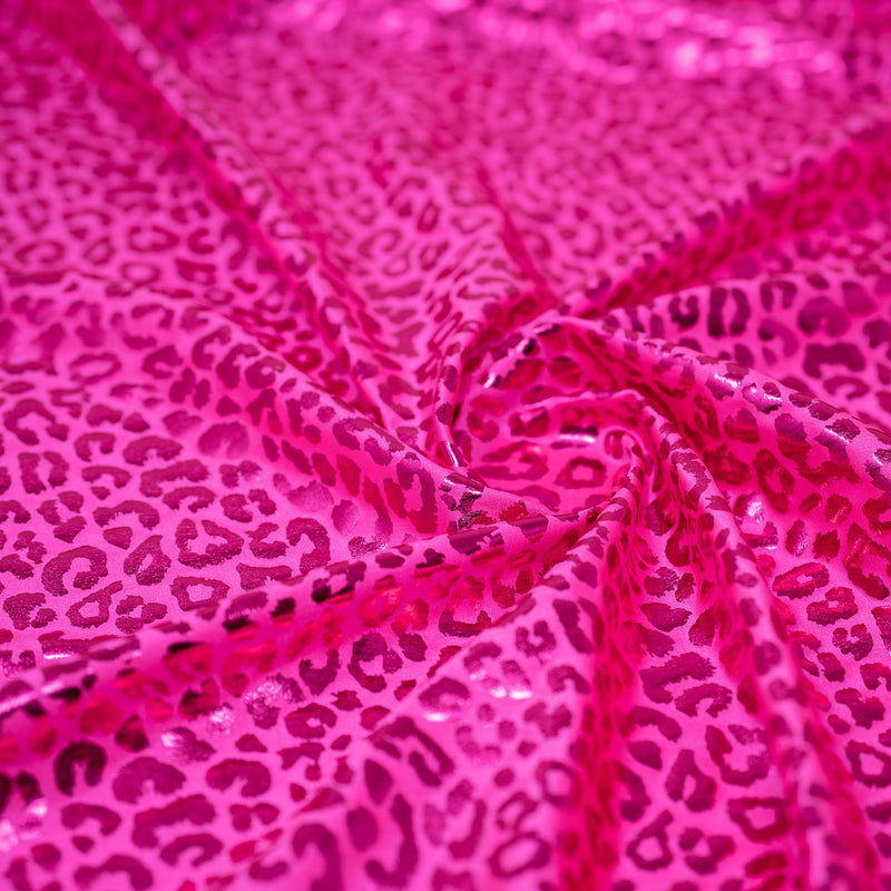 Detailed shot of Loud Leo Foil Printed Spandex in Hot Pink/Fuchsia.