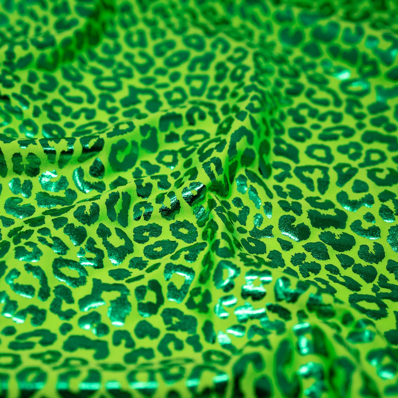 Detailed shot of Loud Leo Foil Printed Spandex in Lime/Green.