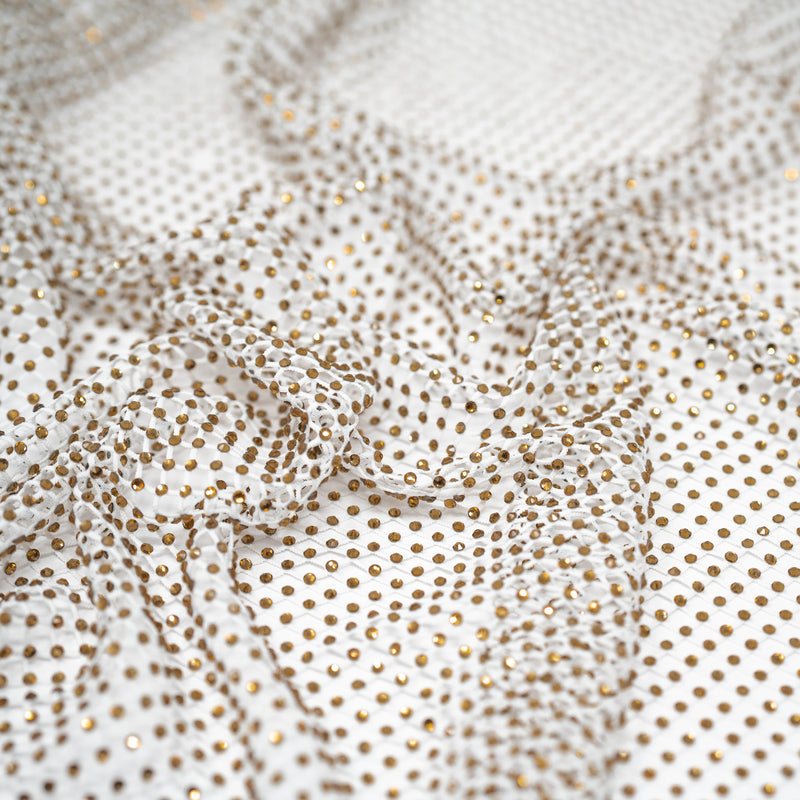 A crumpled piece of Enigma Diamond Fishnet in the color White-Gold