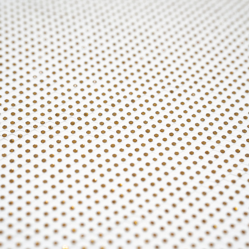 A flat sample of Enigma Diamond Fishnet in the color White-Gold
