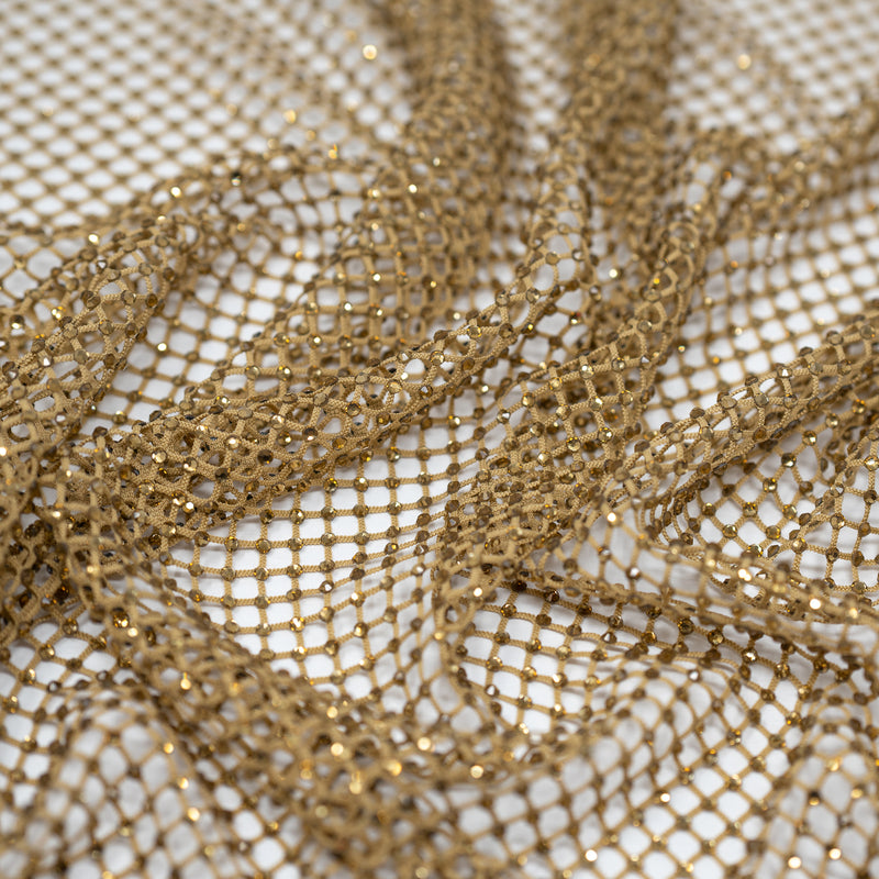 A crumpled piece of Enigma Diamond Fishnet in the color Skin-Skin
