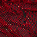 A crumpled piece of Enigma Diamond Fishnet in the color Red-Red