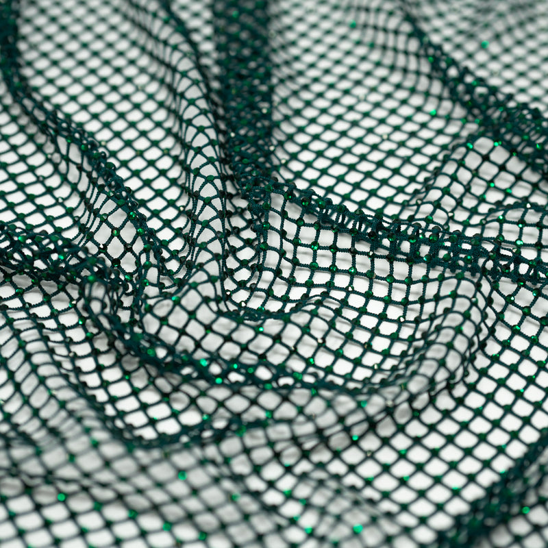 A crumpled piece of Enigma Diamond Fishnet in the color Hunter-Green-Green