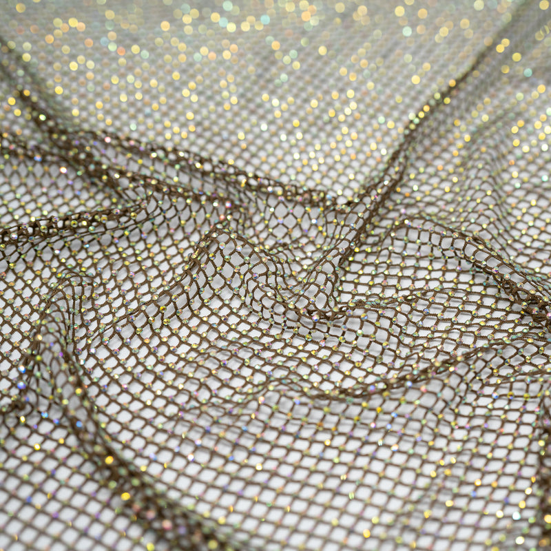 A crumpled piece of Enigma Diamond Fishnet in the color Brown-Rainbow