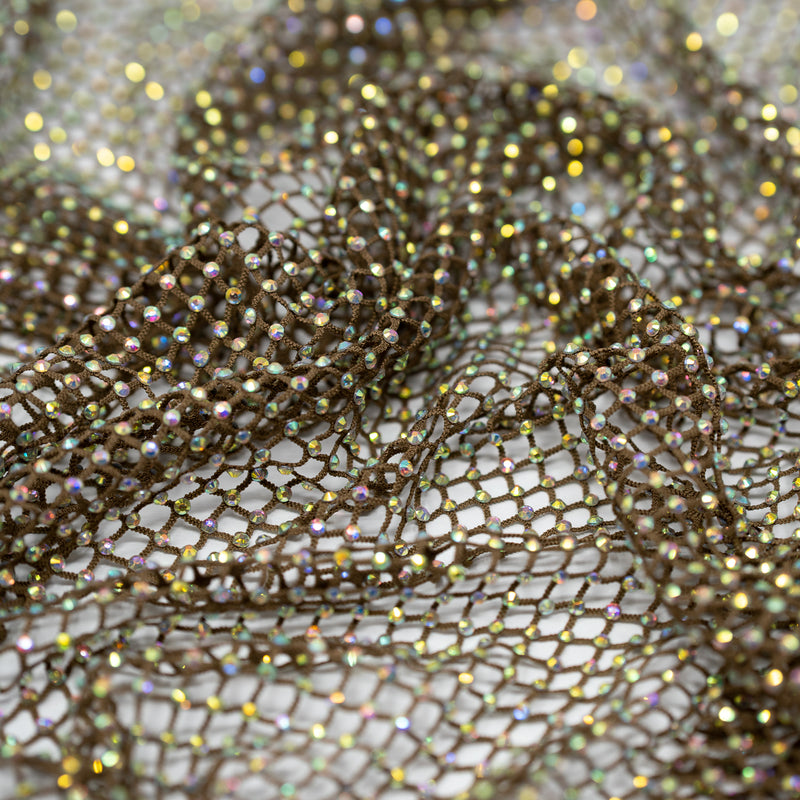 A crumpled piece of Enigma Diamond Fishnet in the color Brown-Rainbow