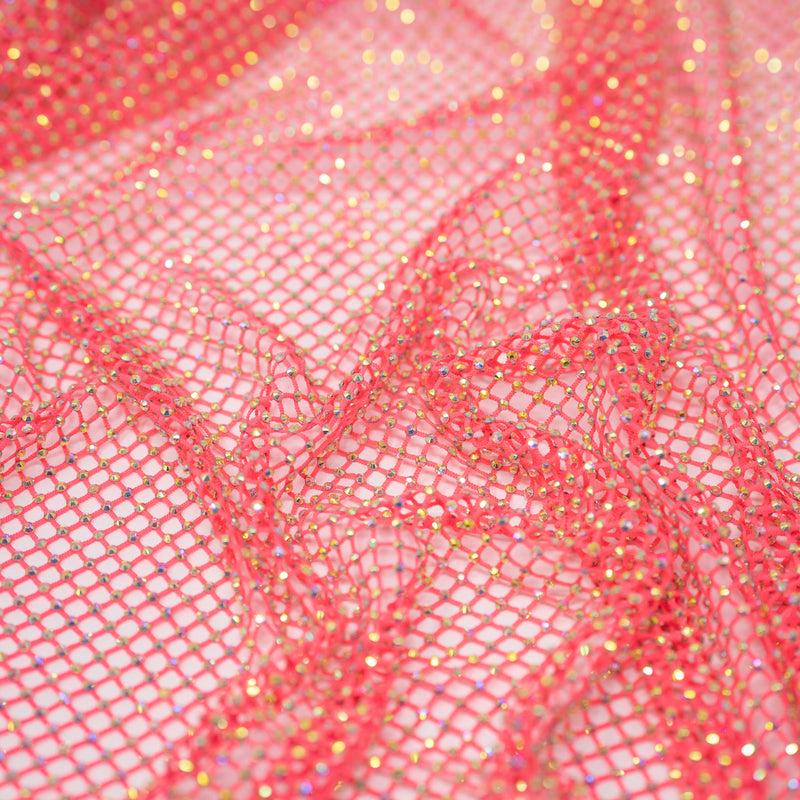 A crumpled piece of Enigma Diamond Fishnet in the color Neon-Pink-Rainbow