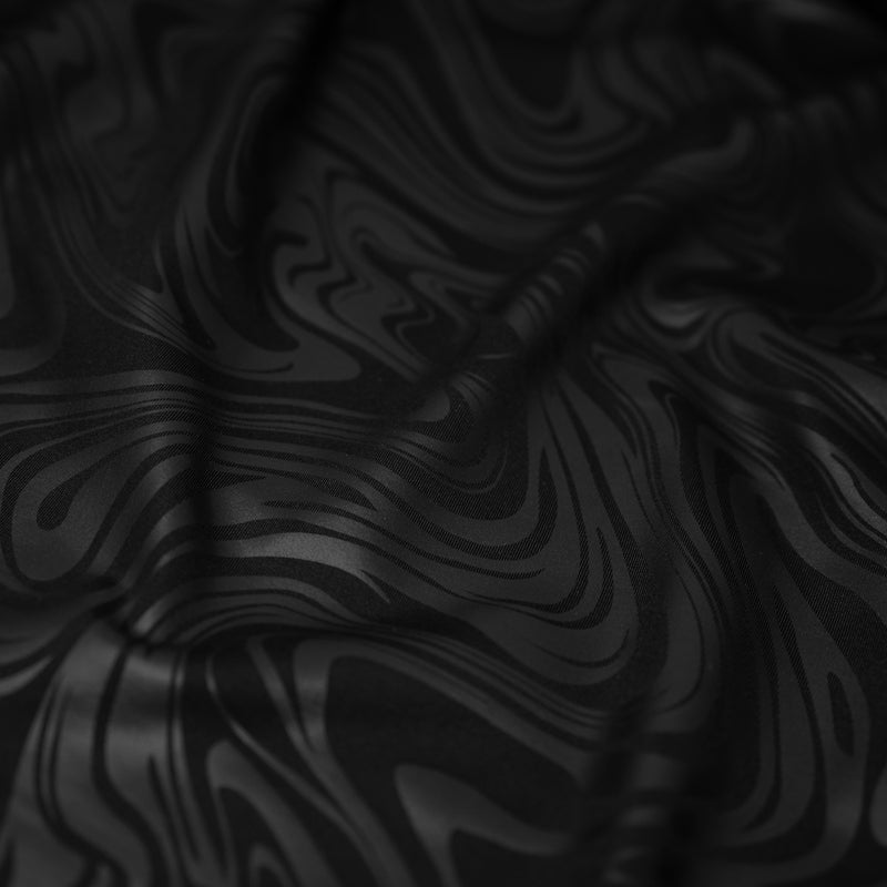 Detailed shot of Marble Foil Printed SuperFlex in color Black/Black