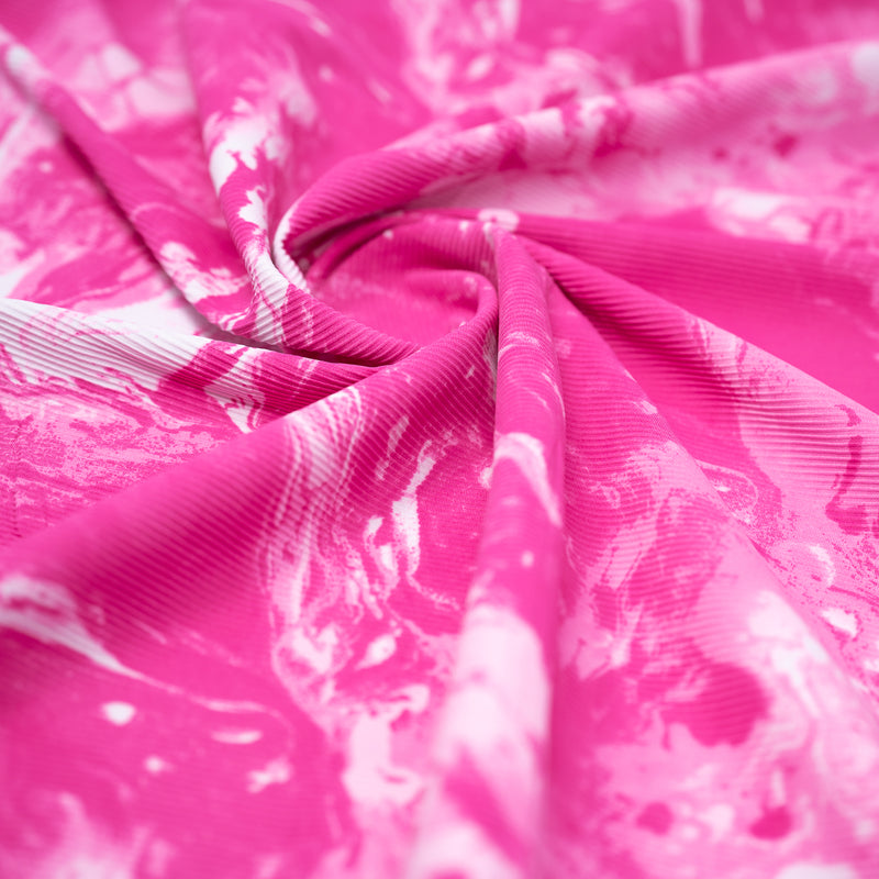 A swirled piece of Marble Tonal Printed Ribbed Spandex in color Positive Pink.