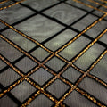 A flat sample of mary jane glitter stretch mesh in the color black-gold.