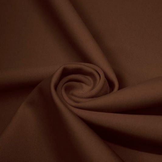 A swirled piece of matte nylon spandex fabric in the color brown.