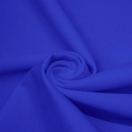 A swirled piece of matte nylon spandex fabric in the color cerulean.