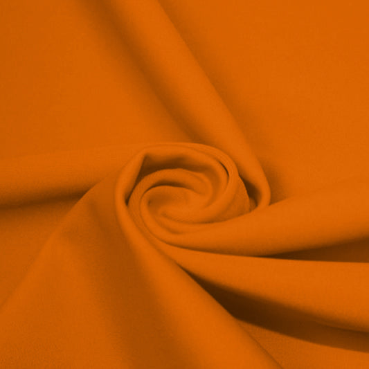 A swirled piece of matte nylon spandex fabric in the color juicy tangerine.