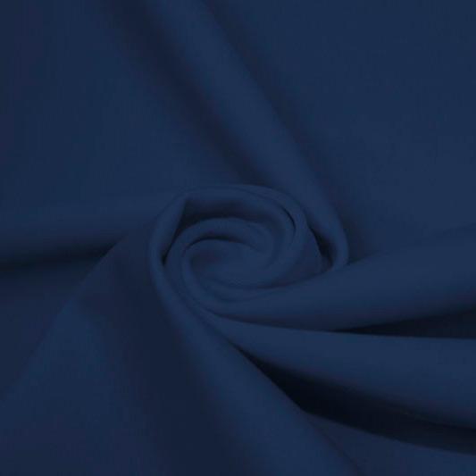 A swirled piece of matte nylon spandex fabric in the color navy.