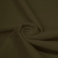 A swirled piece of matte nylon spandex fabric in the color olive green.