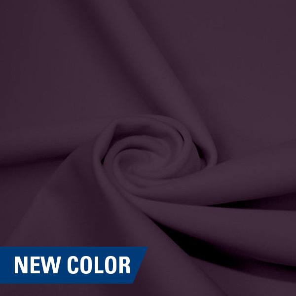 A swirled piece of matte nylon spandex fabric in the color toasted mauve.