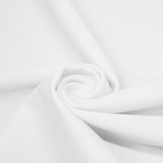 A swirled piece of matte nylon spandex fabric in the color white.