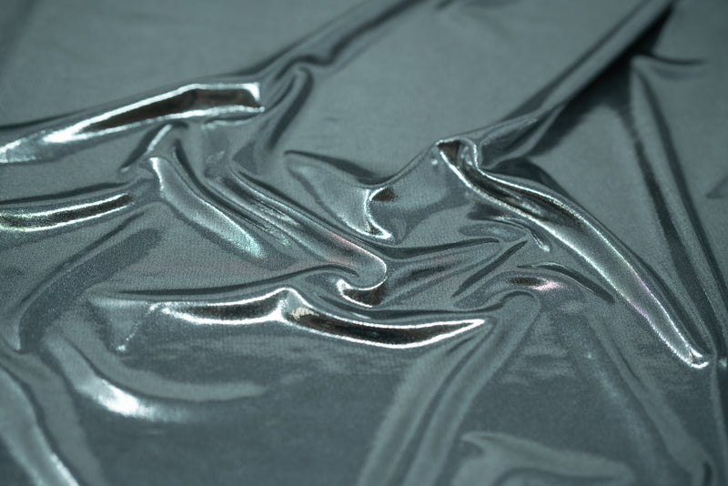 Detailed shot of Mercury Titanium Foiled Spandex in Black/Aqua.