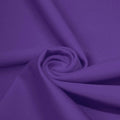 A swirled piece of microfiber nylon spandex in the color purple.