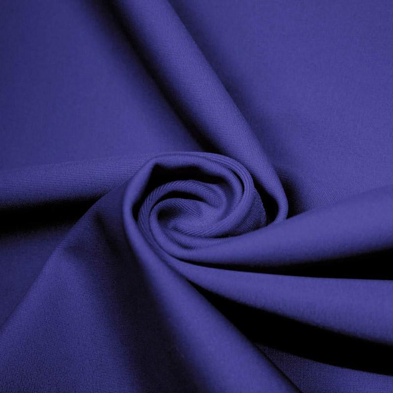 A swirled piece of microfiber nylon spandex in the color royal.