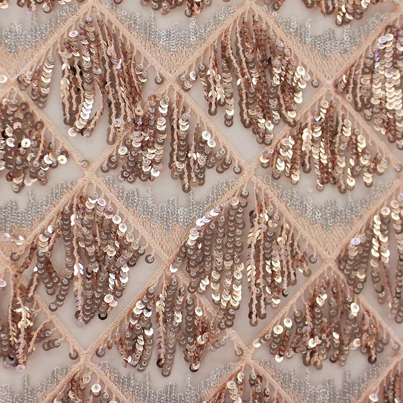 A flat sample of monroe mesh sequin in the color rose gold.