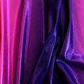 A sample of ombre mystique foiled spandex in the color berry fuchsia.