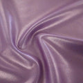 A swirled piece of Mystique Pearl foiled spandex with pink foil on a viola base.