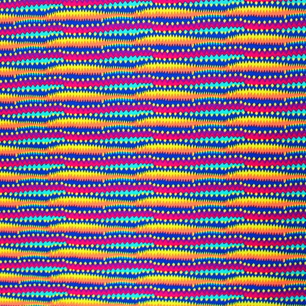 A flat sample of Rainbow multi color Zig Zag Printed Spandex.