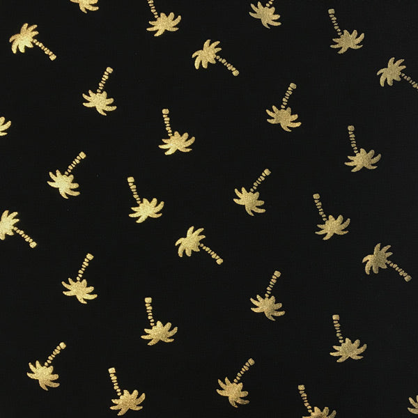 A flat sample of Gold Palm Trees on Black Foiled Spandex.