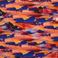 A flat sample of Cloudy Mountain Range Printed Spandex in the colors orange and blue.