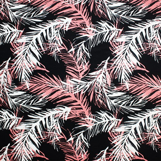 A flat sample of pink palms on black printed spandex.