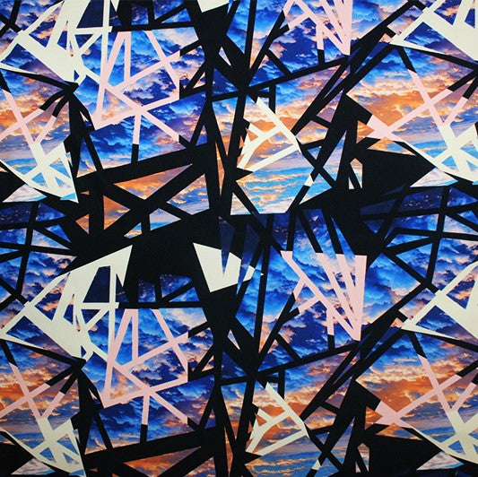 A flat sample of geometrical skies printed spandex.