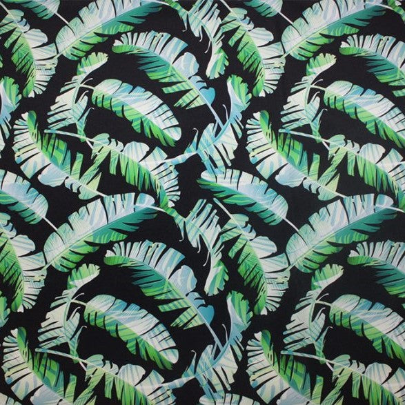A flat sample of tossed feathers printed spandex.