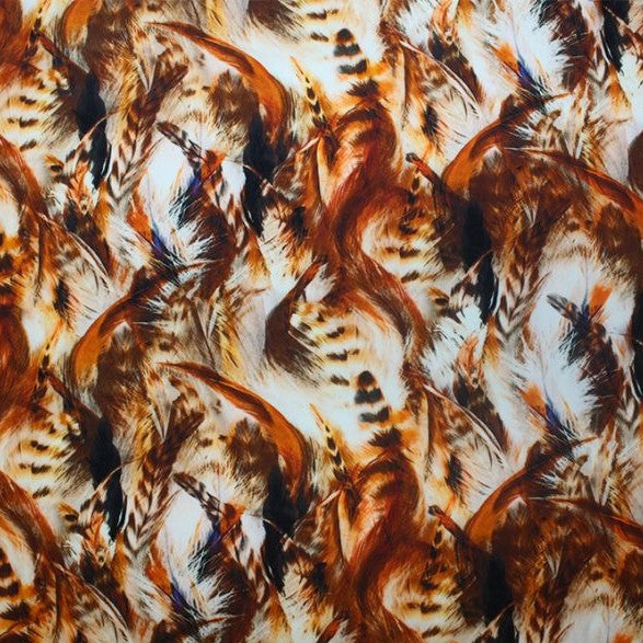 A flat sample of classic feather printed spandex.