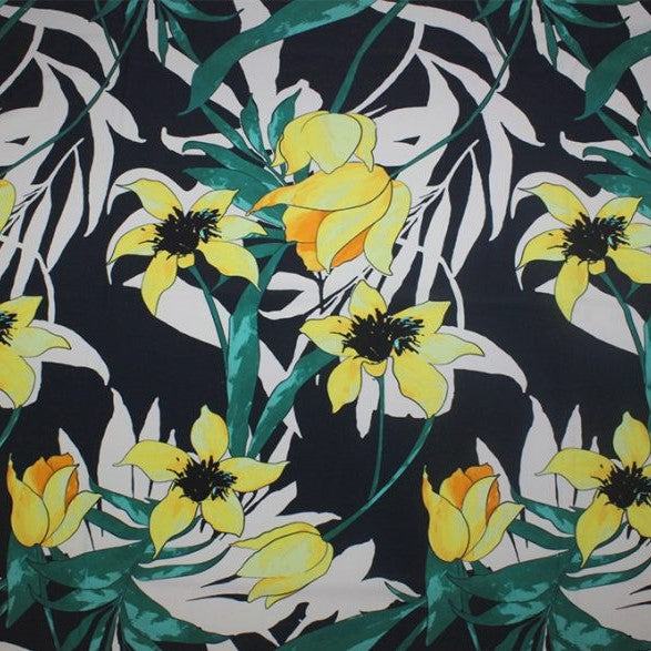 A flat samples of yellow flowers printed spandex.