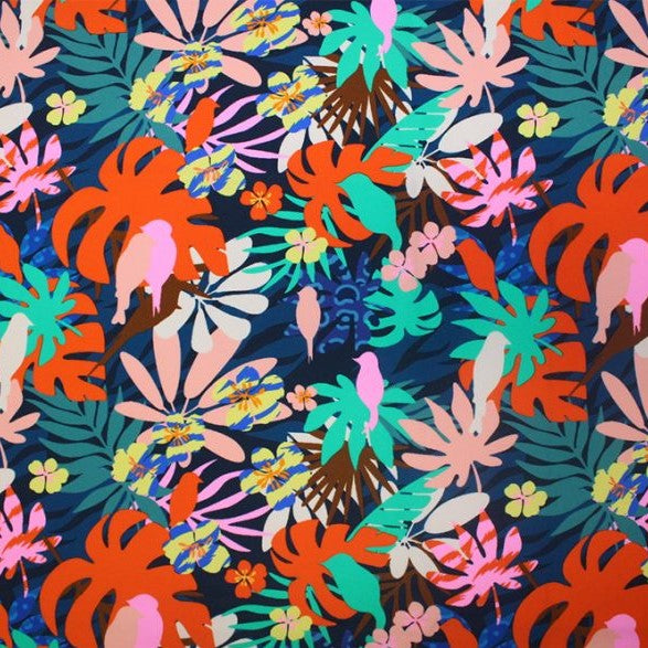 A flat sample of tropical birds printed spandex.