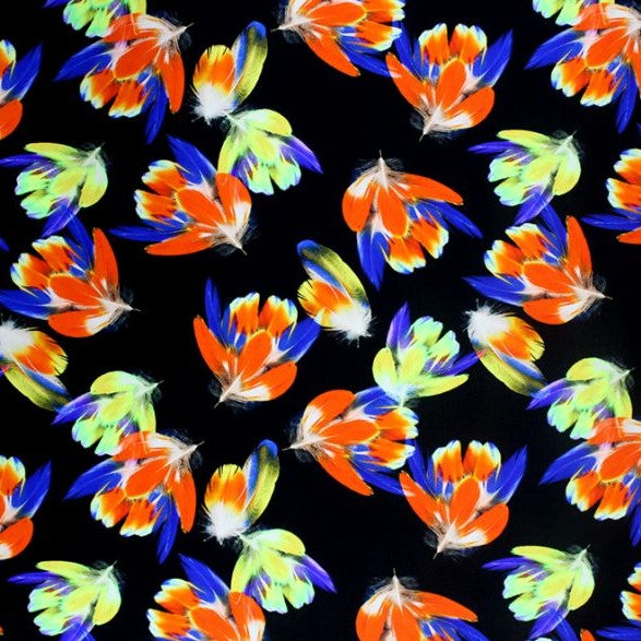 A flat sample of primary floral printed spandex.