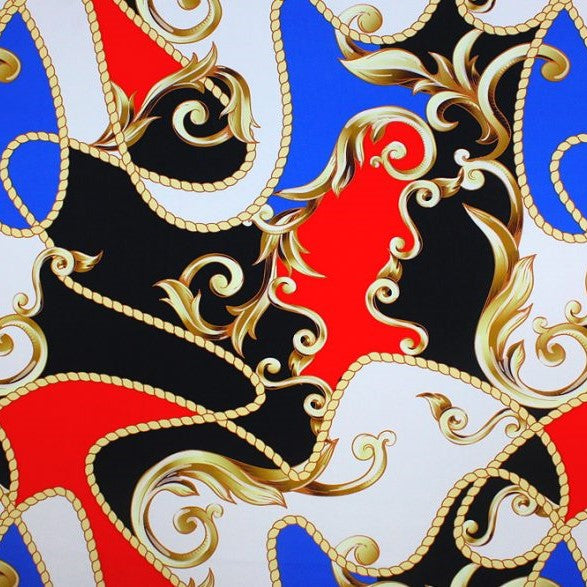 A flat sample of carousel printed spandex in the color black/royal.