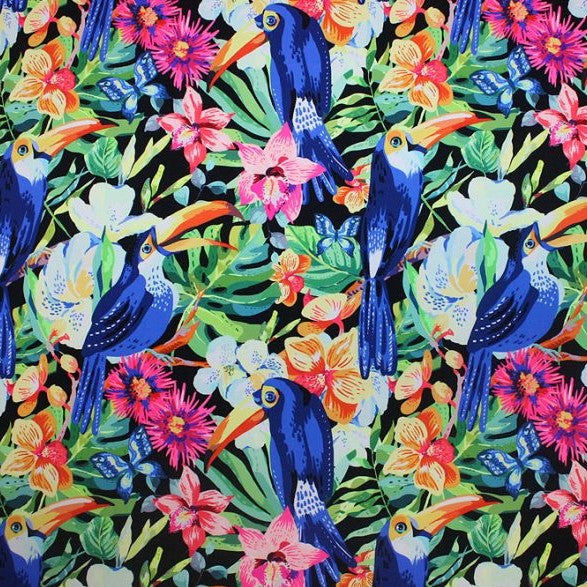 A flat sample of toucans on flowers printed spandex.